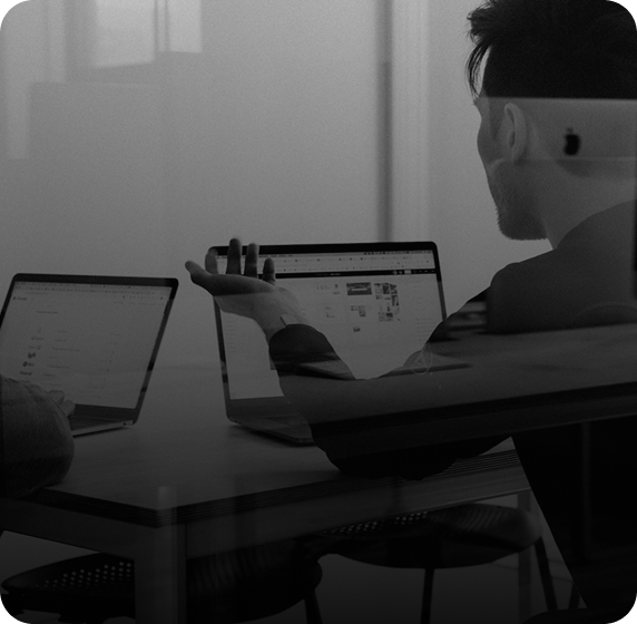 Person at desk with computer